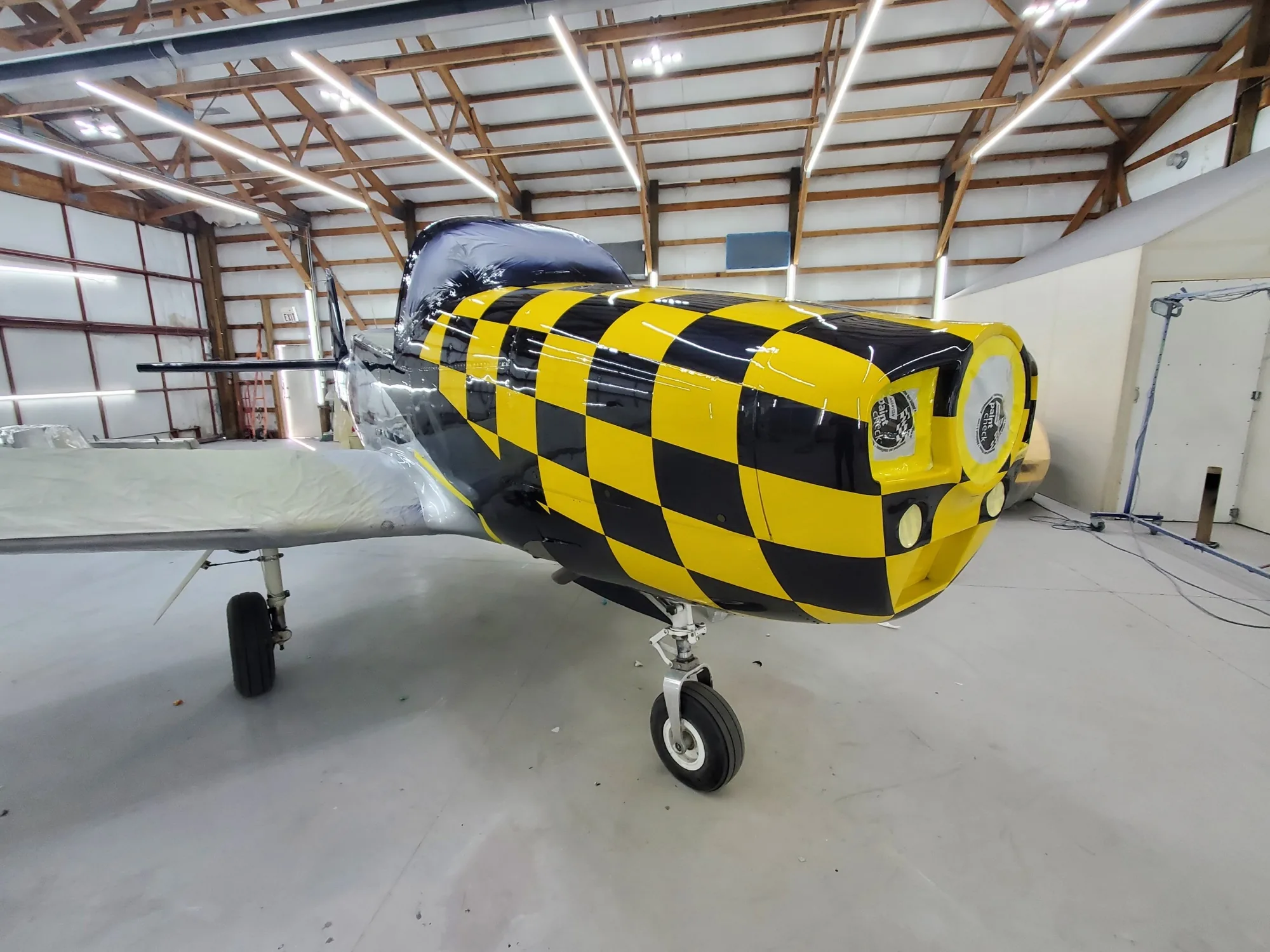 Aircraft cockpit and wing protected during the finishing process